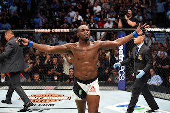 ANAHEIM, CA - JULY 29:  Jon Jones celebrates after knocking out Daniel Cormier in their UFC light heavyweight championship bout during the UFC 214 event at Honda Center on July 29, 2017 in Anaheim, California.  (Photo by Josh Hedges/Zuffa LLC/Zuffa LLC vi