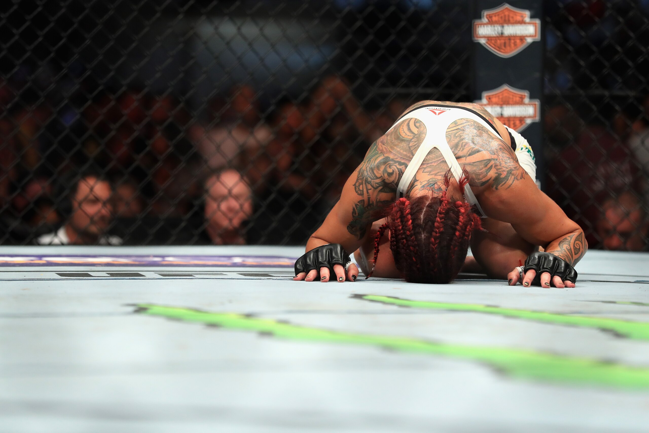 ANAHEIM, CA - JULY 29:  Cris Cyborg of Brazil reacts to defeating Tonya Evinger during their Featherweight Title fight  at UFC 214 at Honda Center on July 29, 2017 in Anaheim, California.  (Photo by Sean M. Haffey/Getty Images)