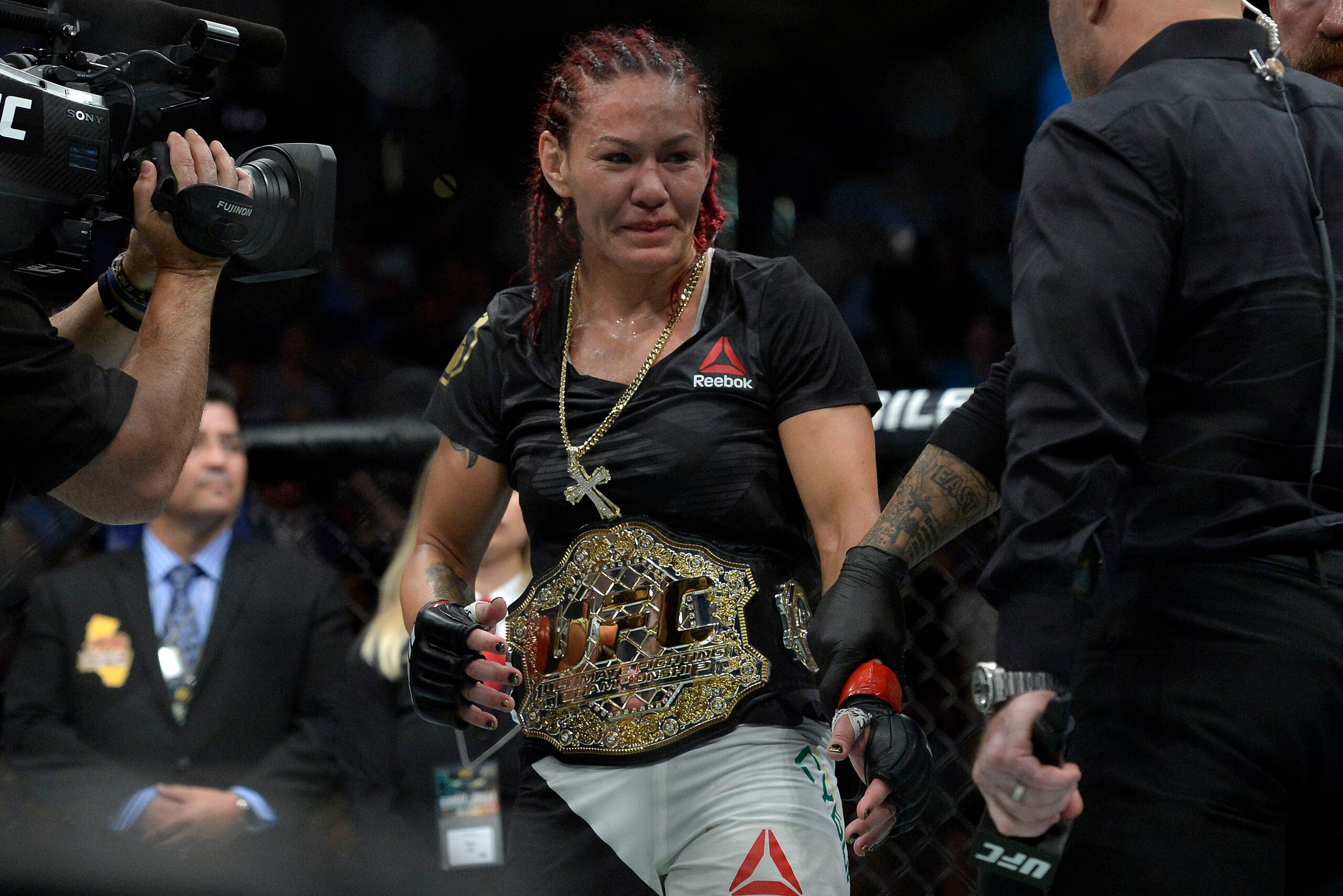 July 29, 2017; Anaheim, CA, USA; Cris Cyborg is declared the winner by TKO and champion against Tonya Evinger during UFC 214 at Honda Center. Mandatory Credit: Gary A. Vasquez-USA TODAY Sports