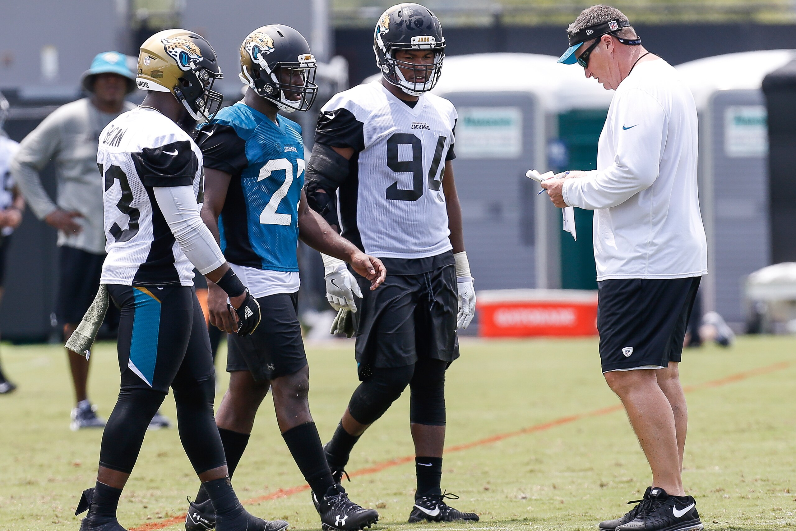 JACKSONVILLE, FL - JULY 28: Rookies Linebacker Blair Brown #53, Runningback Leonard Fournette #27 and Defensive End Dawuane Smoot #94 talk with Head Coach Doug Marrone of the Jacksonville Jaguars during Training Camp at Florida Blue Health and Wellness Pr