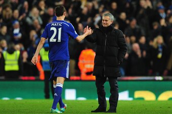 STOKE ON TRENT, ENGLAND - DECEMBER 22:  Chelsea player Nemanja Matic is congratulated by his mananger Jose Mourinho after the Barclays Premier League match between Stoke City and Chelsea at Britannia Stadium on December 22, 2014 in Stoke on Trent, England