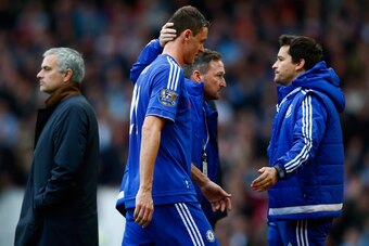 LONDON, ENGLAND - OCTOBER 24:  Nemanja Matic (2nd L) of Chelsea walks past Manager Jose Mourinho (1st L) after being shown a red card during the Barclays Premier League match between West Ham United and Chelsea at Boleyn Ground on October 24, 2015 in Lond