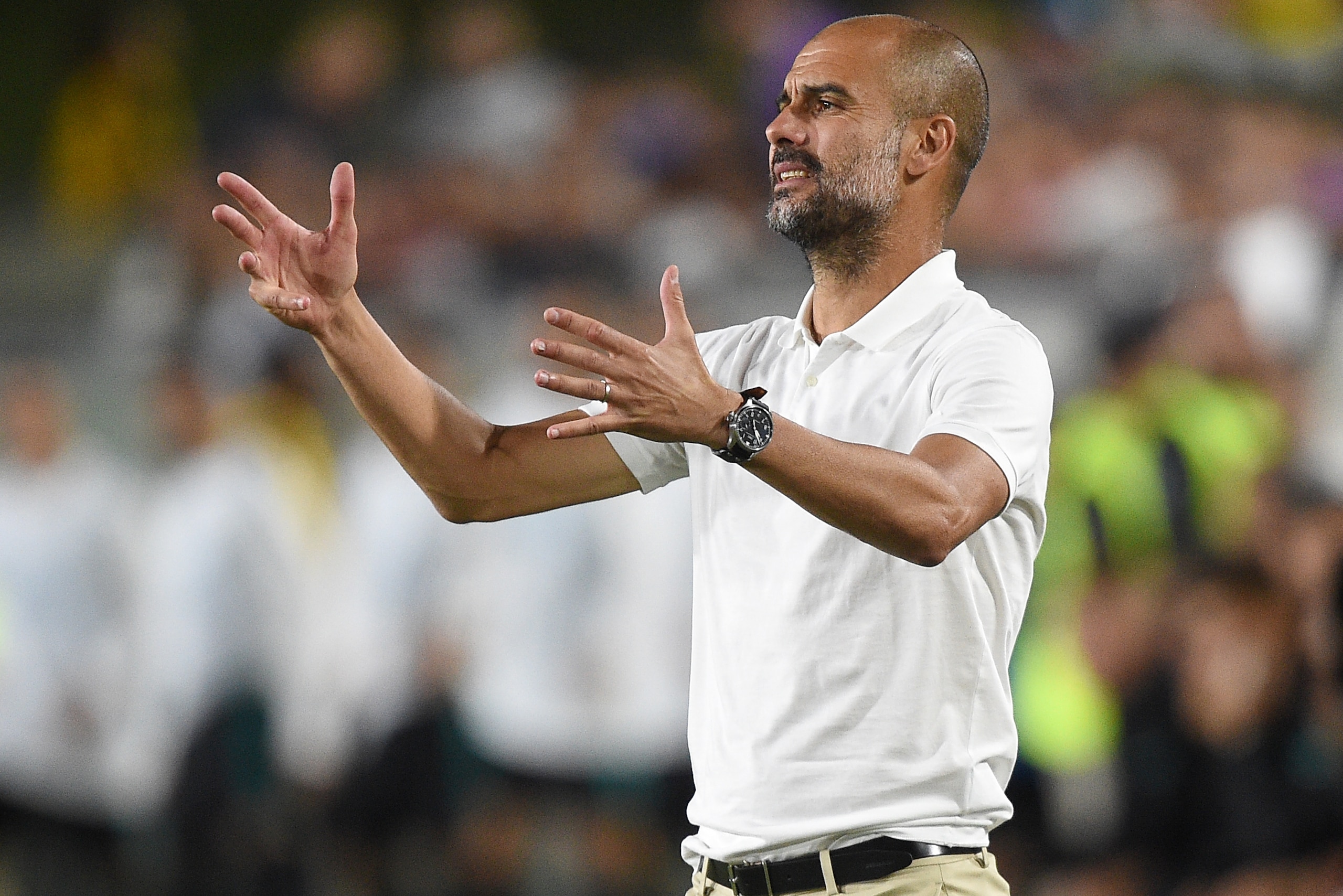LOS ANGELES, CA - JULY 26: Manager Pep Guardiola of Manchester City reacts on the sideline during the International Champions Cup 2017 soccer match against Real Madrid at the Los Angeles Coliseum July 26, 2017, in Los Angeles, California. (Photo by Kevork