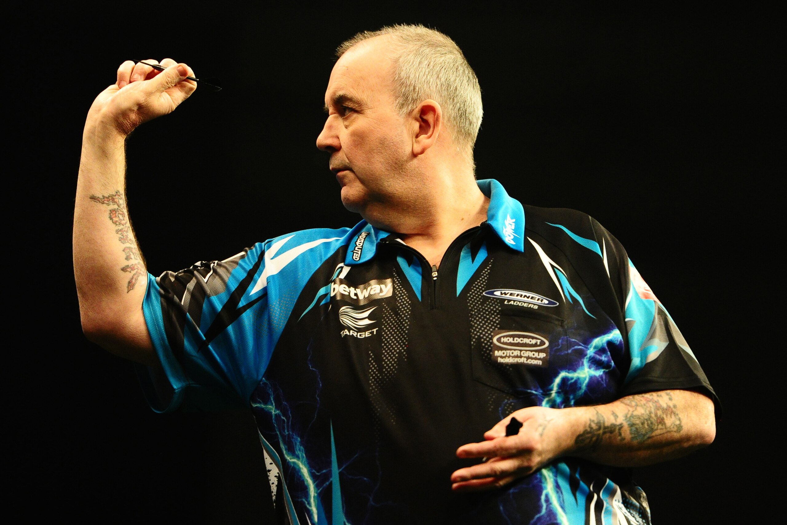 EXETER, UNITED KINGDOM - MARCH 02: Phil Taylor throws during Night Five of the Betway Premier League Darts at Westpoint Arena on March 2, 2017 in Exeter, England. (Photo by Harry Trump/Getty Images)