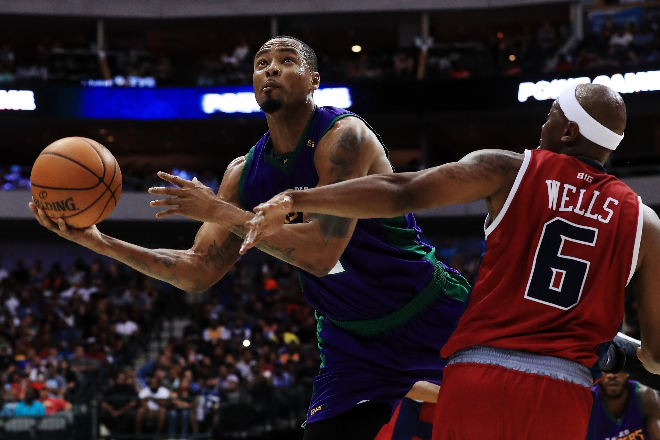 DALLAS, TX - JULY 30:   Rashard Lewis #9 of the 3 Headed Monsters attempts a shot while being guarded by Bonzi Wells #6 of Tri-State during week six of the BIG3 three on three basketball league at American Airlines Center on July 30, 2017 in Dallas, Texas