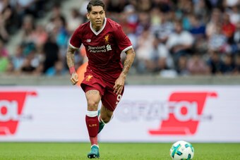 BERLIN, GERMANY - JULY 29:  Roberto Firmino of Liverpool FC runs with the ball during the Preseason Friendly match between Hertha BSC and FC Liverpool at Olympiastadion on July 29, 2017 in Berlin, Germany.  (Photo by Boris Streubel/Getty Images)