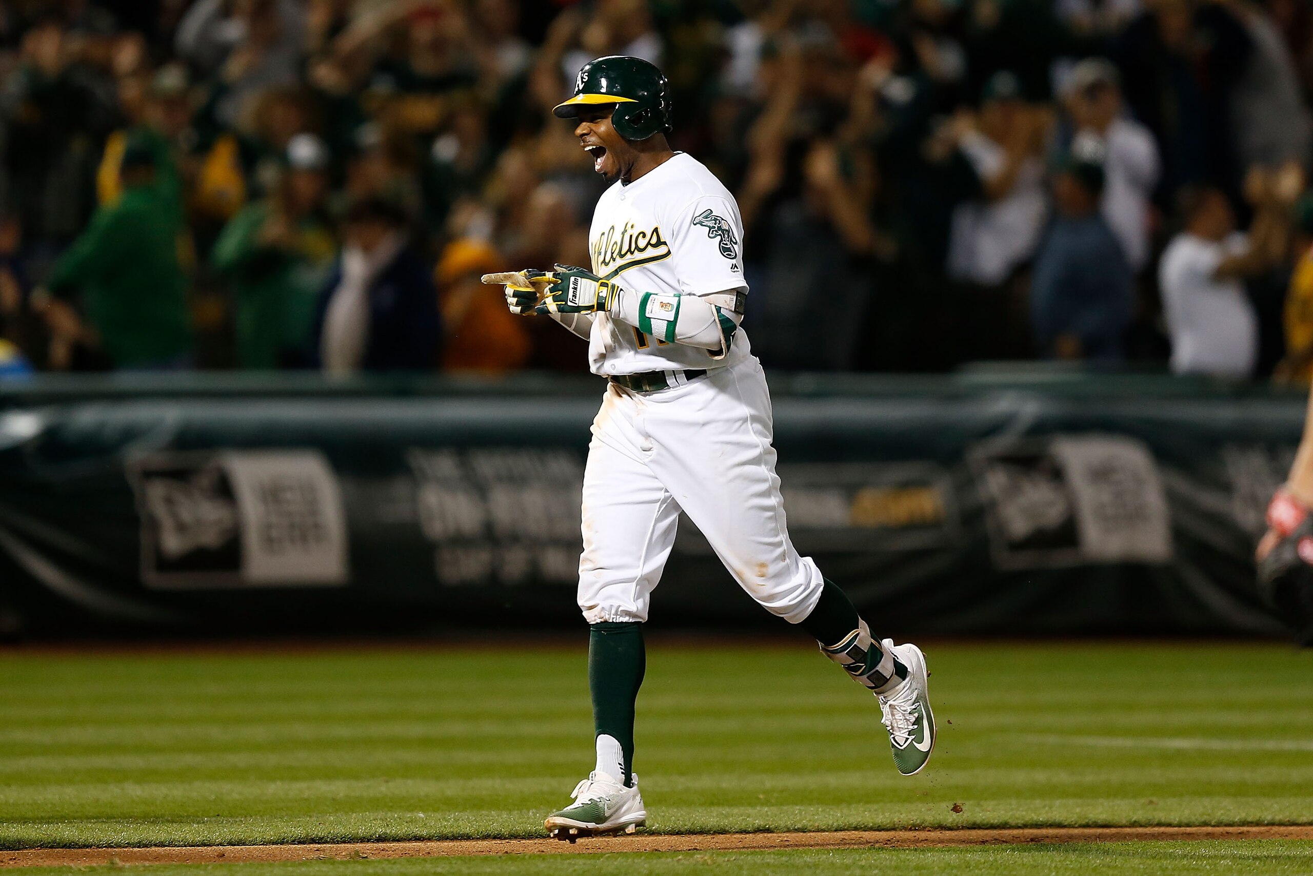 OAKLAND, CA - JULY 29: Rajai Davis #11 of the Oakland Athletics celebrates after hitting a two-run walk-off home run in the 9th inning against the Minnesota Twins at Oakland Alameda Coliseum on July 29, 2017 in Oakland, California. (Photo by Lachlan Cunni OAKLAND, CA - JULY 29: Rajai Davis #11 of the Oakland Athletics celebrates after hitting a two-run walk-off home run in the 9th inning against the Minnesota Twins at Oakland Alameda Coliseum on July 29, 2017 in Oakland, California. (Photo by Lachlan Cunni