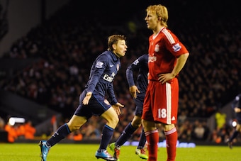 LIVERPOOL, ENGLAND - DECEMBER 13:  Andrey Arshavin of Arsenal  celebrates scoring his team's second goal during the Barclays Premier League match between Liverpool and Arsenal at Anfield on December 13, 2009 in Liverpool, England.  (Photo by Michael Regan