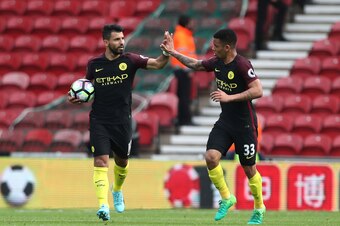MIDDLESBROUGH, ENGLAND - APRIL 30: Sergio Aguero of Manchester City celebrates scoring his sides first goal from the penalty spot with Gabriel Jesus of Manchester City during the Premier League match between Middlesbrough and Manchester City at the Rivers