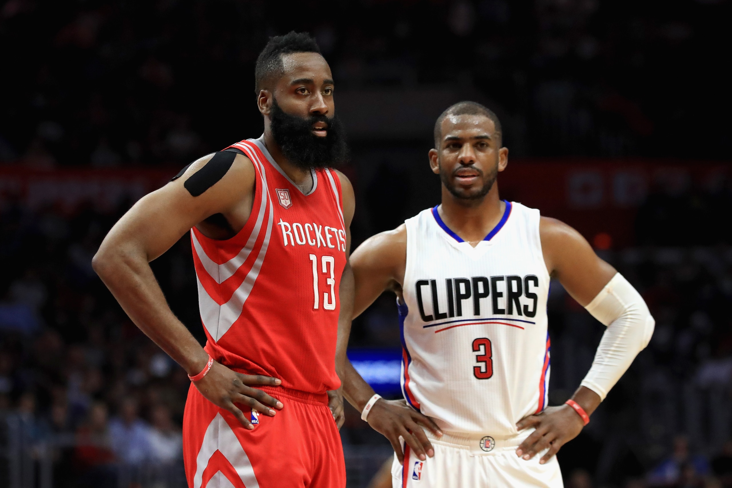 LOS ANGELES, CA - APRIL 10:  James Harden #13 of the Houston Rockets and Chris Paul #3 of the LA Clippers look on during the second  half of a game at Staples Center on April 10, 2017 in Los Angeles, California.  NOTE TO USER: User expressly acknowledges 