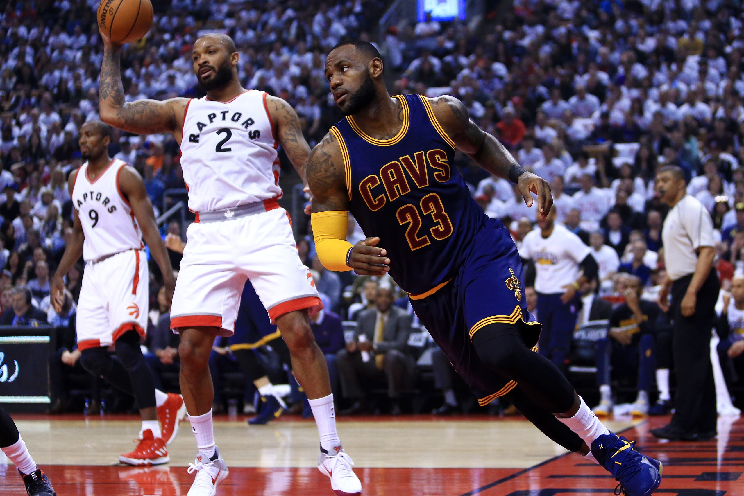 TORONTO, ON - MAY 07:  Lebron James #23 of the Cleveland Cavaliers runs up the court as P.J. Tucker #2 of the Toronto Raptors defends in the first half of Game Four of the Eastern Conference Semifinals during the 2017 NBA Playoffs at Air Canada Centre on 