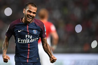 TOPSHOT - Paris Saint-Germain's Brazilian defender Dani Alves reacts after a goal of Paris Saint-Germain's French midfielder Adrien Rabiot during the French Trophy of Champions (Trophee des Champions) football match between Monaco (ASM) and Paris Saint-Ge
