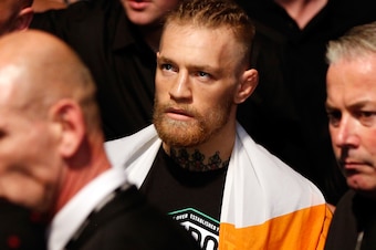 DUBLIN, IRELAND - JULY 19:  Conor McGregor enters the arena before his featherweight bout against Diego Brandao during the UFC Fight Night event at The O2 Dublin on July 19, 2014 in Dublin, Ireland.  (Photo by Josh Hedges/Zuffa LLC/Zuffa LLC via Getty Ima