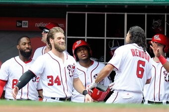 WASHINGTON, DC - JULY 27:  Anthony Rendon #6 of the Washington Nationals celebrates with Bryce Harper #34 after hitting a home run in the third inning against the Milwaukee Brewers at Nationals Park on July 27, 2017 in Washington, DC.  (Photo by G Fiume/G