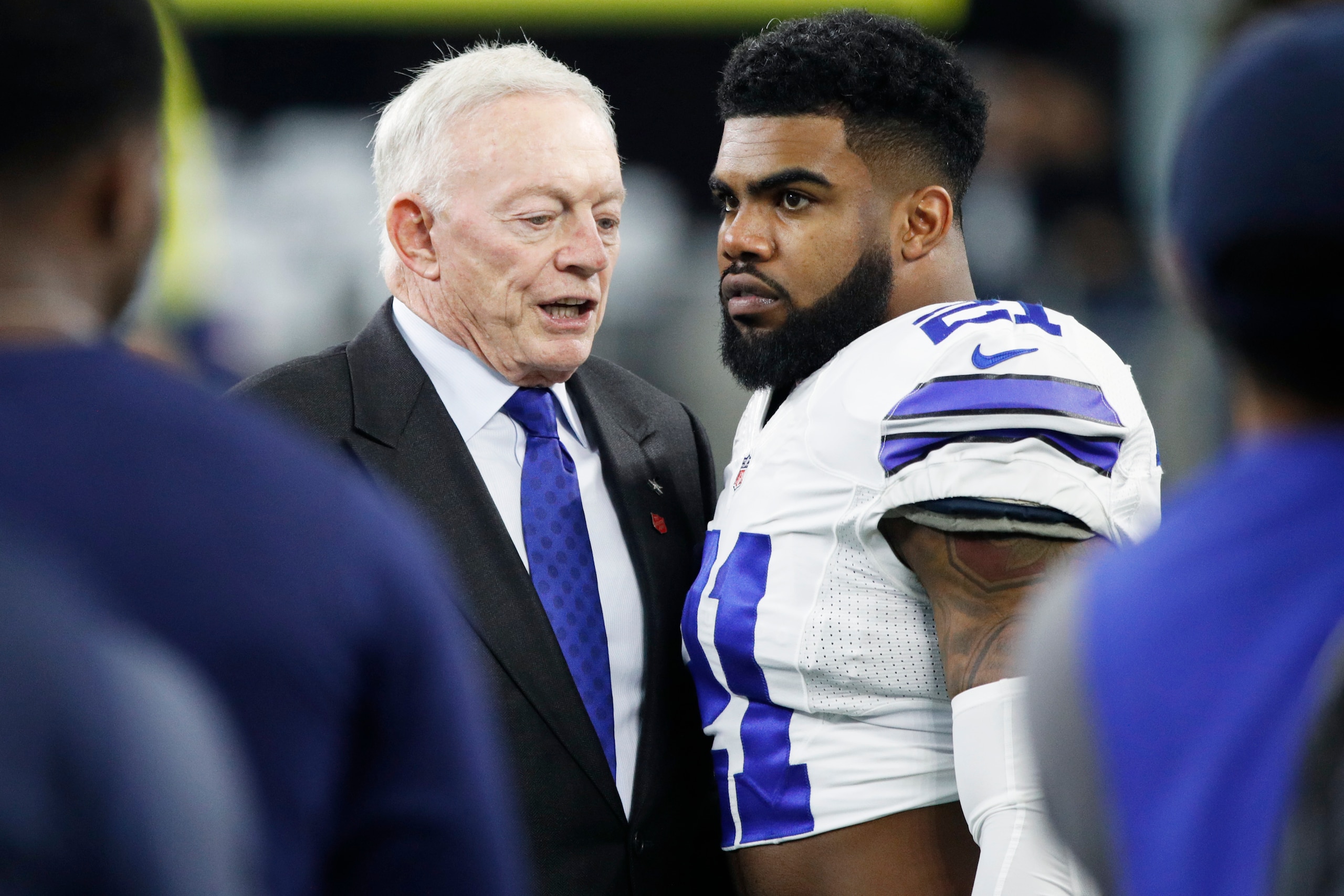 ARLINGTON, TX - JANUARY 15: Ezekiel Elliott #21 of the Dallas Cowboys talks with owner Jerry Jones prior to the NFC Divisional Playoff game against the Green Bay Packers at AT&T Stadium on January 15, 2017 in Arlington, Texas. The Packers defeated the Cow