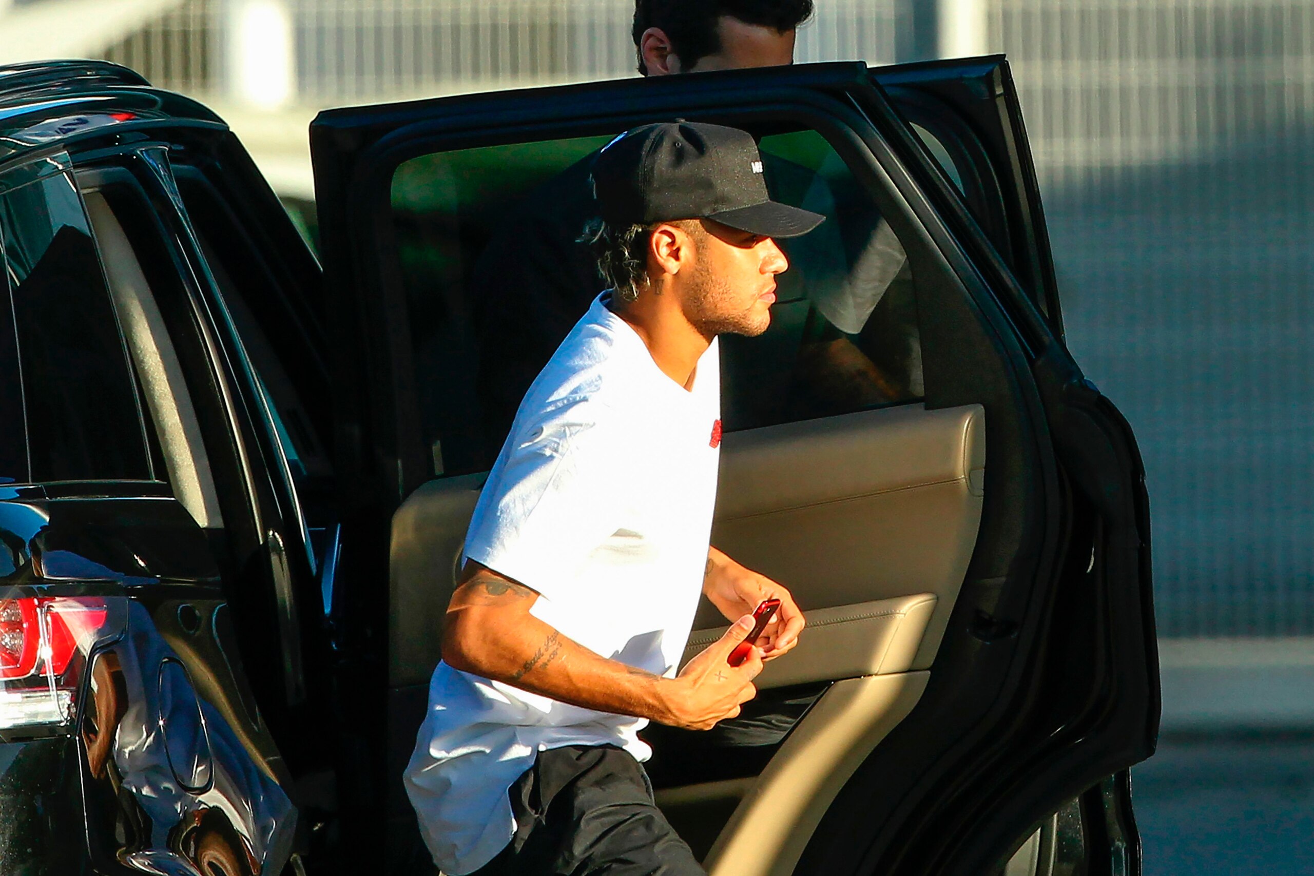 Brazilian football player Neymar is pictured upon his arrival at Francisco Sa Carneiro airport on the outskirts of Porto, during a stop over from Barcelona with his private jet on August 2, 2017.
Neymar could be presented as a Paris Saint-Germain player a