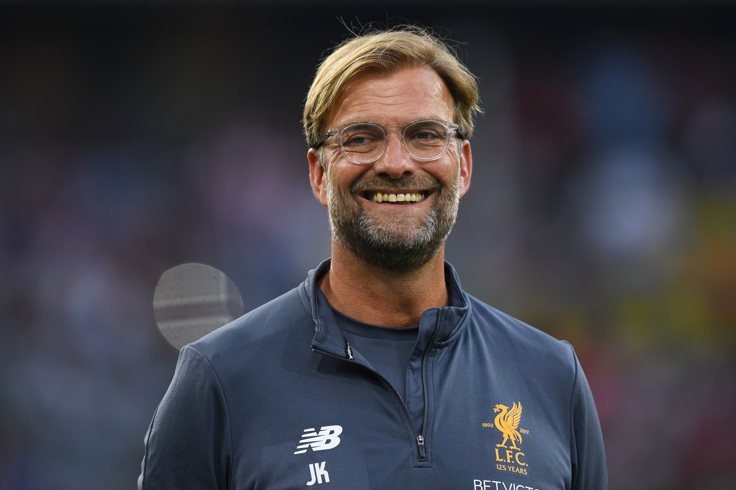 Liverpools German headcoach Juergen Klopp laughs prior the final Audi Cup football match between Atletico Madrid and FC Liverpool in the stadium in Munich, southern Germany, on August 2, 2017.  / AFP PHOTO / Christof STACHE        (Photo credit should rea