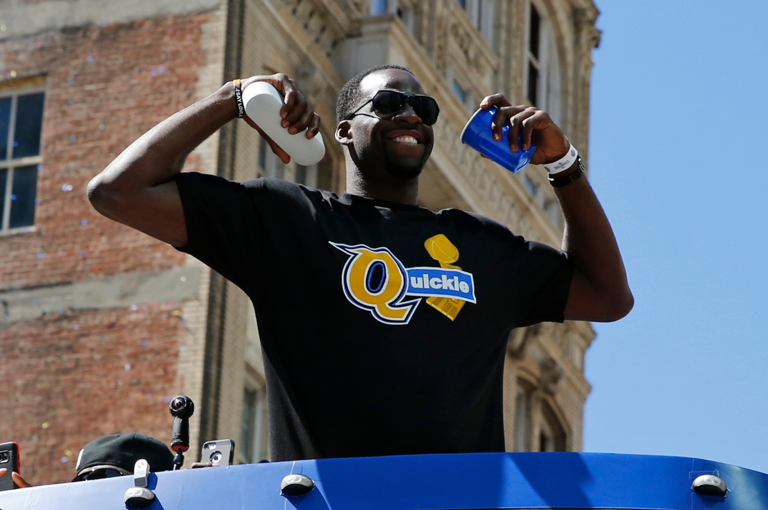 OAKLAND, CA - JUNE 15:  Draymond Green #23 of the Golden State Warriors flexes for the crowd during the Victory Parade and Rally on June 15, 2017 in Oakland, California at The Henry J. Kaiser Convention. NOTE TO USER: User expressly acknowledges and agree