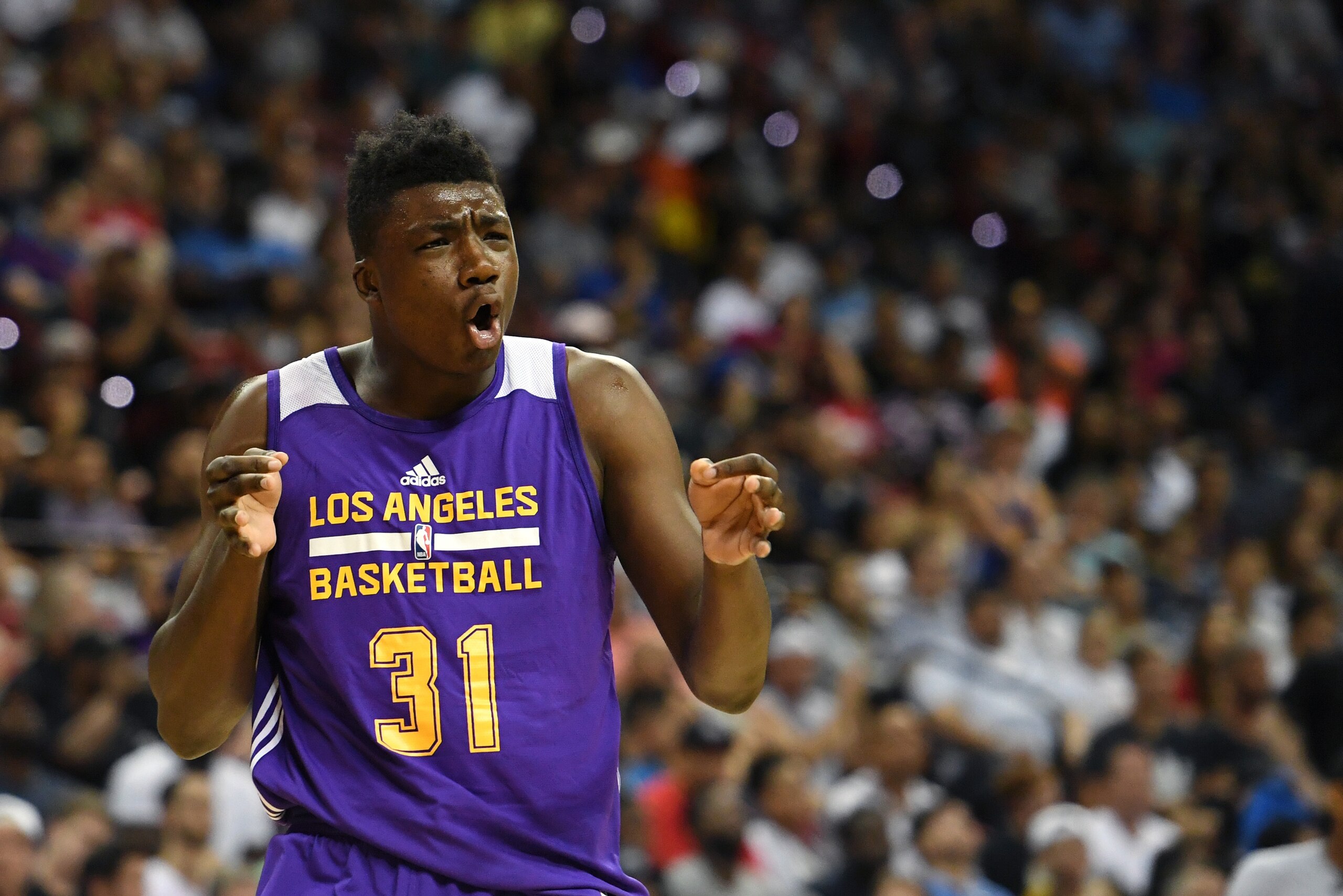 LAS VEGAS, NV - JULY 16:  Thomas Bryant #31 of the Los Angeles Lakers reacts after a teammate scored against the Dallas Mavericks during a semifinal game of the 2017 Summer League at the Thomas & Mack Center on July 16, 2017 in Las Vegas, Nevada. Los Ange
