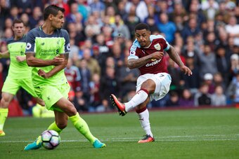 BURNLEY, ENGLAND - AUGUST 20: Andre Gray of Burnley scores a goal to make it 2-0 during the Premier League match between Burnley and Liverpool at Turf Moor on August 20, 2016 in Burnley, England. (Photo by Robbie Jay Barratt - AMA/Getty Images)