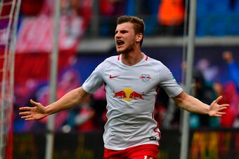 Leipzig's forward Timo Werner celebrates after scoring the 4-2 during the German first division Bundesliga football match between RB Leipzig and FC Bayern Munich on May 13, 2017 in Leipzig, eastern Germany.  / AFP PHOTO / John MACDOUGALL / RESTRICTIONS: D