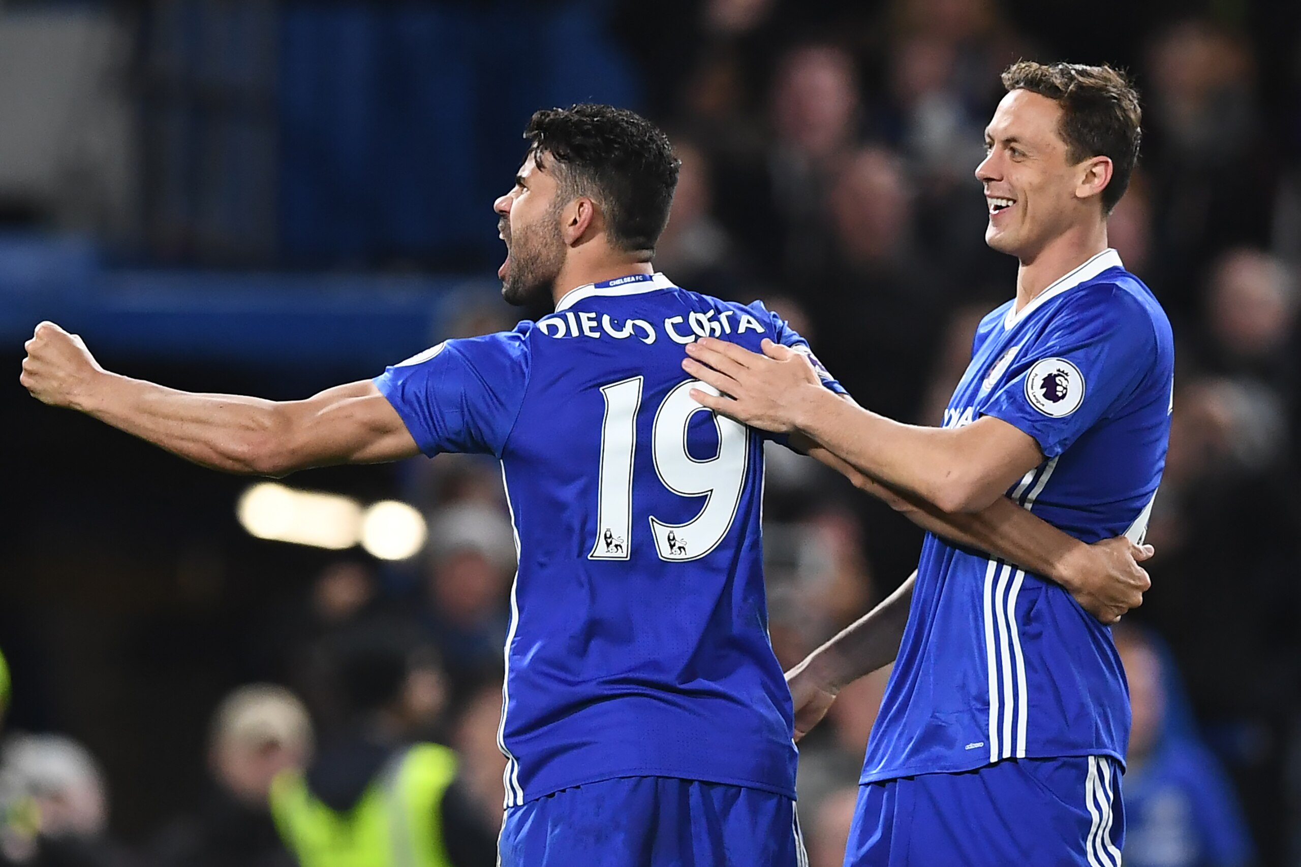 Chelsea's Brazilian-born Spanish striker Diego Costa (L) celebrates with Chelsea's Serbian midfielder Nemanja Matic after scoring their third goal during the English Premier League football match between Chelsea and Southampton at Stamford Bridge in Londo