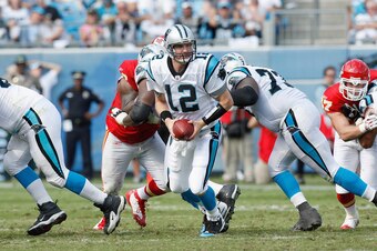 CHARLOTTE, NC - OCTOBER 05:  Josh McCown #12 of the Carolina Panthers moves back to hand off during the game against the Kansas City Chiefs at Bank of America on October 5, 2008 in Charlotte, North Carolina.  (Photo by Kevin C. Cox/Getty Images)