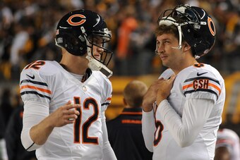 PITTSBURGH, PA - SEPTEMBER 22:  Quarterbacks Josh McCown #12 and  Jay Cutler #6 of the Chicago Bears talk on the sideline during a game against the Pittsburgh Steelers at Heinz Field on September 22, 2013 in Pittsburgh, Pennsylvania.  The Bears defeated t