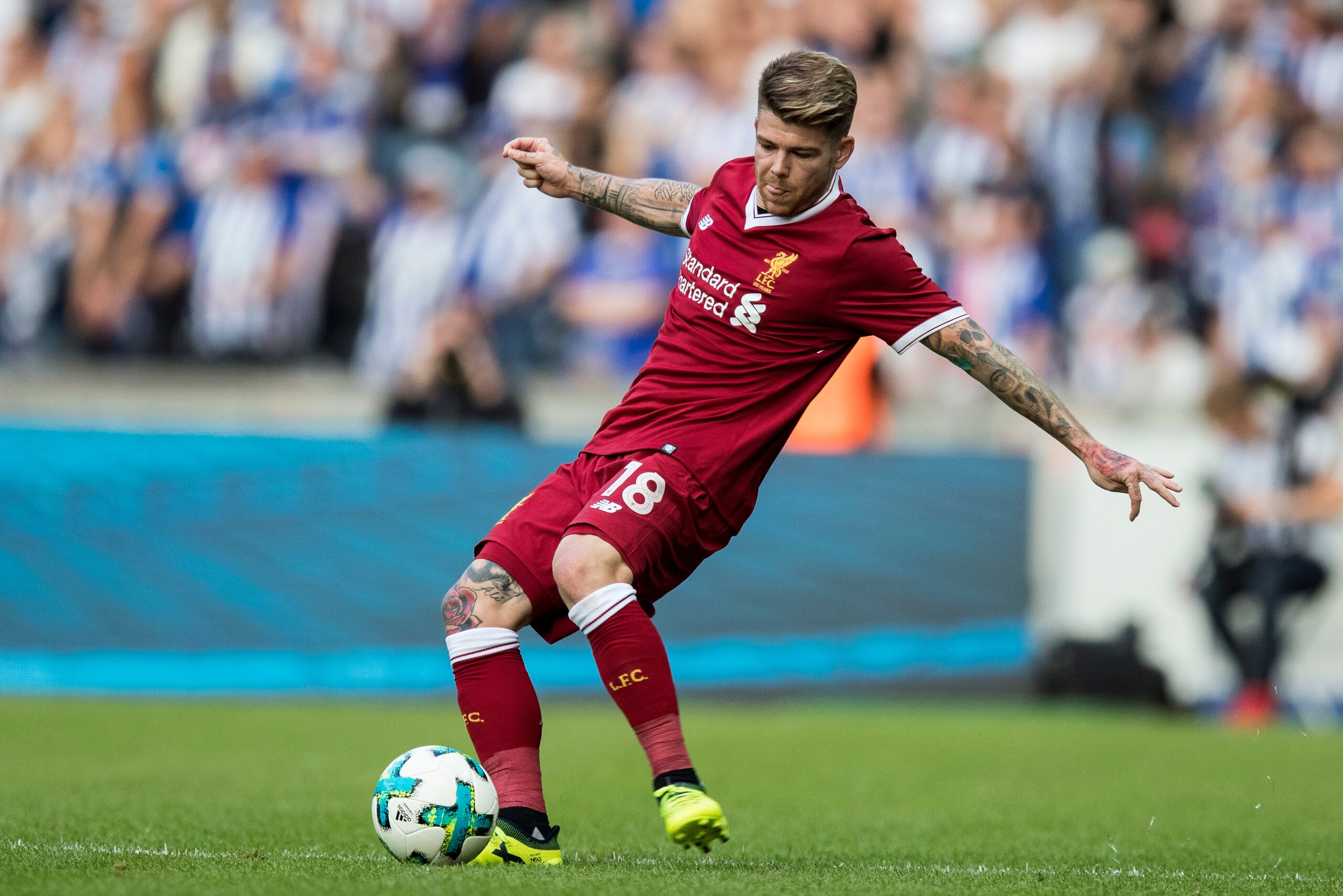 BERLIN, GERMANY - JULY 29:  Alberto Moreno of Liverpool FC runs with the ball during the Preseason Friendly match between Hertha BSC and FC Liverpool at Olympiastadion on July 29, 2017 in Berlin, Germany.  (Photo by Boris Streubel/Getty Images)