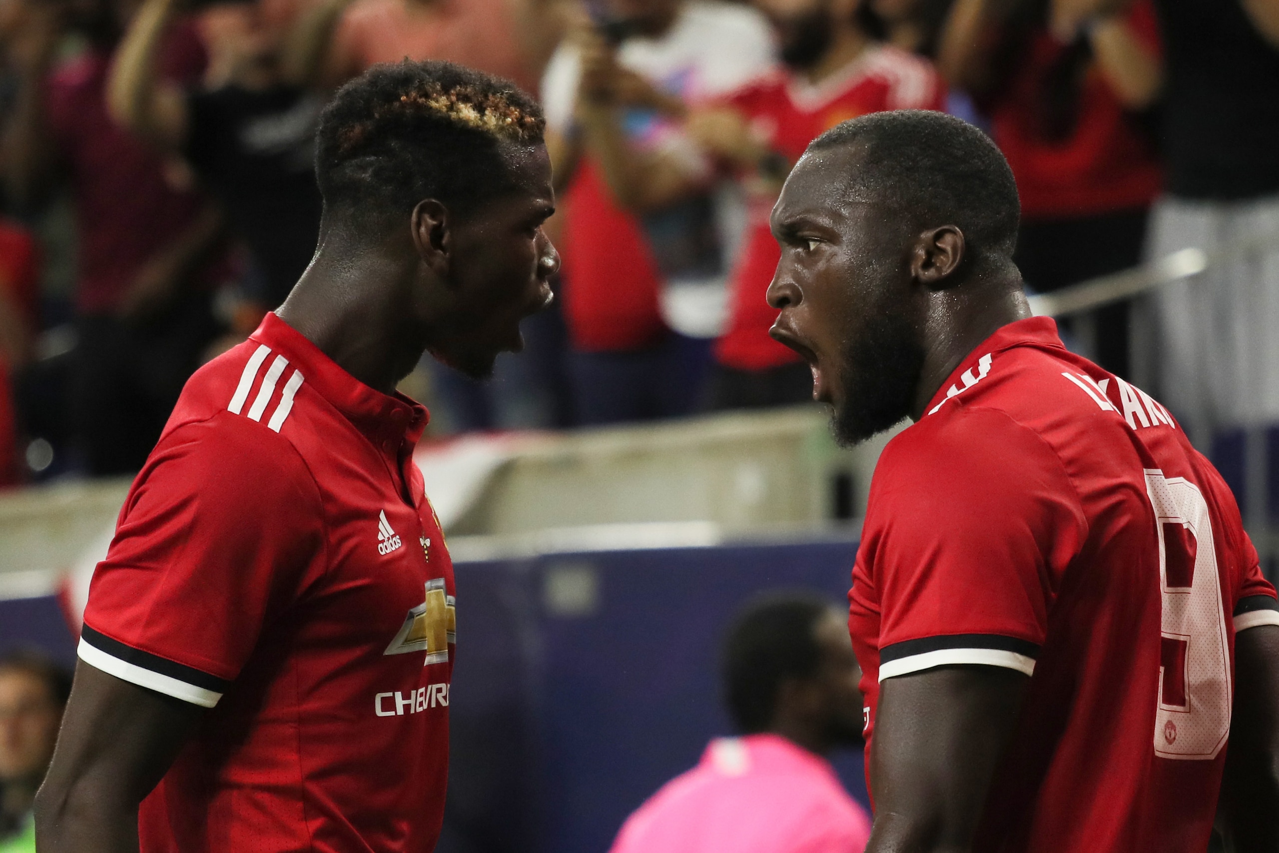 HOUSTON, TX - JULY 20: Romelu Lukaku of Manchester United celebrates after scoring a goal to make it 1-0 with Paul Pogba during the International Champions Cup 2017 match between Manchester United and Manchester City at NRG Stadium on July 20, 2017 in Hou