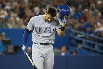 TORONTO, CANADA - JUNE 27: Joey Gallo #13 of the Texas Rangers reacts after striking out to end the eighth inning during MLB game action against the Toronto Blue Jays on June 27, 2015 at Rogers Centre in Toronto, Ontario, Canada. (Photo by Tom Szczerbowsk