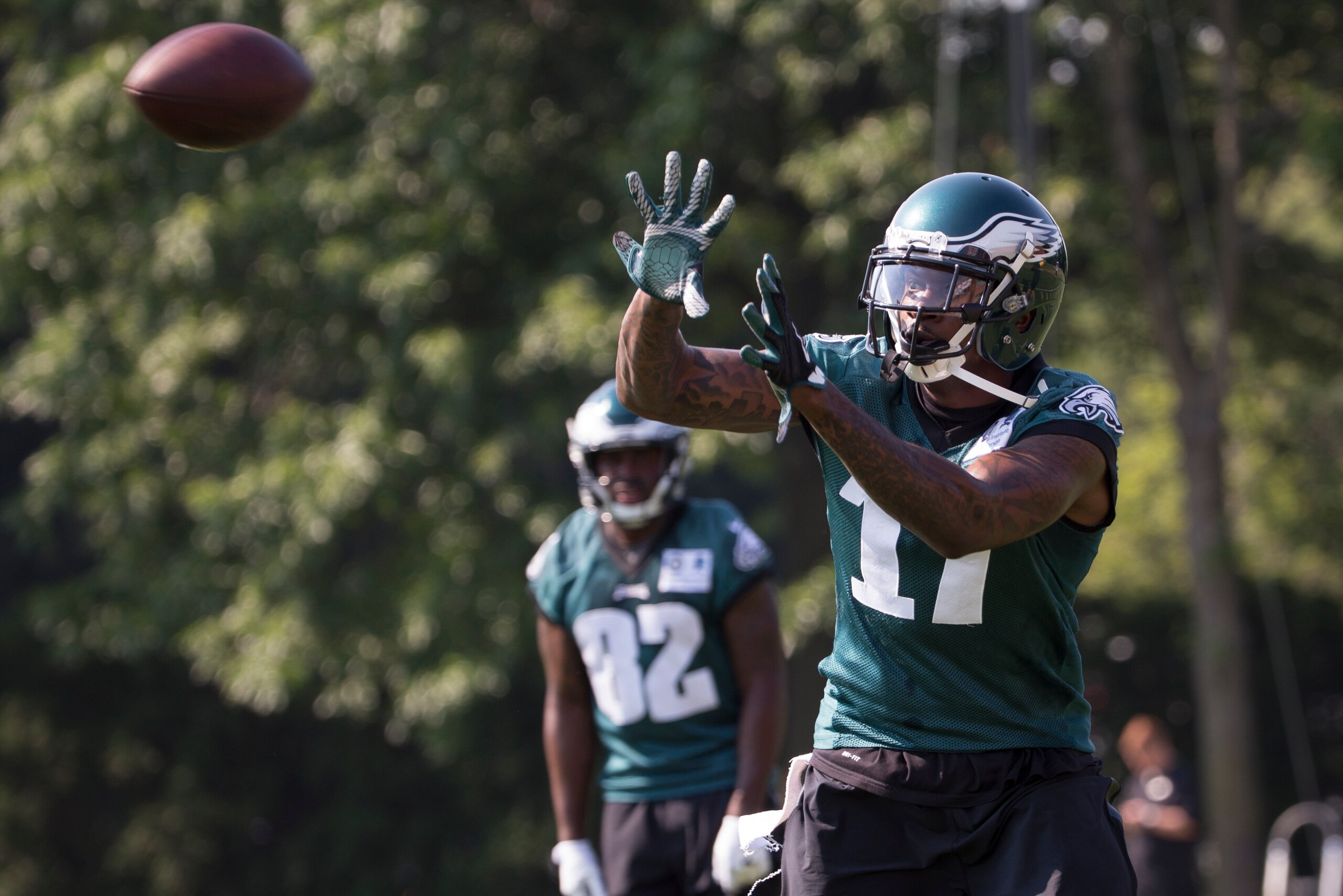 PHILADELPHIA, PA - JUNE 13: Alshon Jeffery #17of the Philadelphia Eagles catches the ball as Torrey Smith #82 looks during mandatory minicamp at the NovaCare Complex on June 13, 2017 in Philadelphia, Pennsylvania. (Photo by Mitchell Leff/Getty Images)
