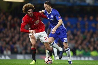 LONDON, ENGLAND - MARCH 13:  Nemanja Matic of Chelsea holds off Marouane Fellaini of Manchester United during The Emirates FA Cup Quarter-Final match between Chelsea and Manchester United at Stamford Bridge on March 13, 2017 in London, England.  (Photo by