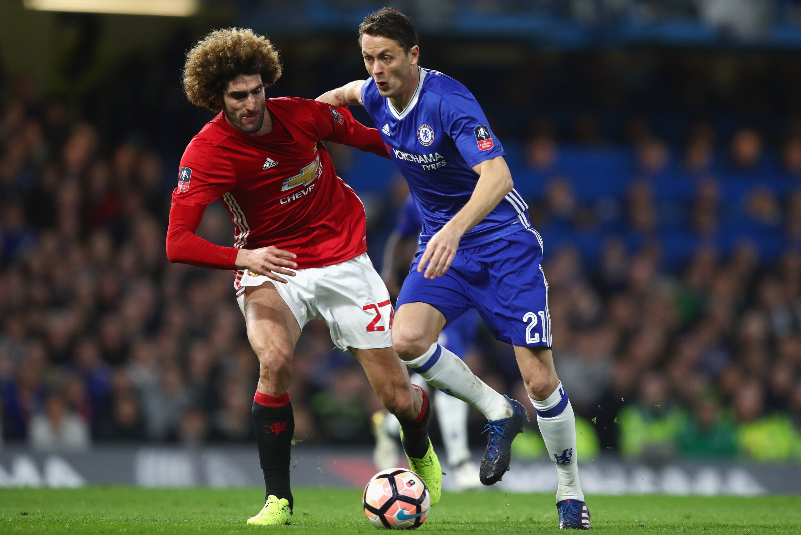 LONDON, ENGLAND - MARCH 13:  Nemanja Matic of Chelsea holds off Marouane Fellaini of Manchester United during The Emirates FA Cup Quarter-Final match between Chelsea and Manchester United at Stamford Bridge on March 13, 2017 in London, England.  (Photo by