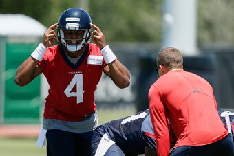 HOUSTON, TX - MAY 13: Deshaun Watson #4 of the Houston Texans runs through drills during Texans rookie camp on May 13, 2017 in Houston, Texas. (Photo by Bob Levey/Getty Images)