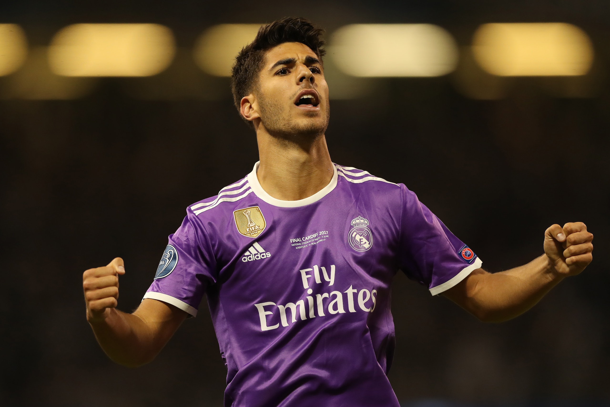 CARDIFF, WALES - JUNE 03: Marco Asensio of Real Madrid celebrates at full time during the UEFA Champions League Final between Juventus and Real Madrid at National Stadium of Wales on June 3, 2017 in Cardiff, Wales. (Photo by Ian MacNicol/Getty Images)