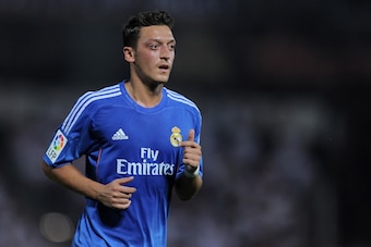 GRANADA, SPAIN - AUGUST 26: Mesut Ozil of Real Madrid CF looks on during the La Liga match between Granada CF and Real Madrid CF at Estadio Nuevo Los Carmenes on August 26, 2013 in Granada, Spain. (Photo by Denis Doyle/Getty Images) GRANADA, SPAIN - AUGUST 26: Mesut Ozil of Real Madrid CF looks on during the La Liga match between Granada CF and Real Madrid CF at Estadio Nuevo Los Carmenes on August 26, 2013 in Granada, Spain. (Photo by Denis Doyle/Getty Images)