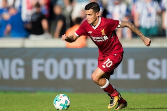 BERLIN, GERMANY - JULY 29:  Philippe Coutinho of Liverpool FC runs with the ball during the Preseason Friendly match between Hertha BSC and FC Liverpool at Olympiastadion on July 29, 2017 in Berlin, Germany.  (Photo by Boris Streubel/Getty Images)
