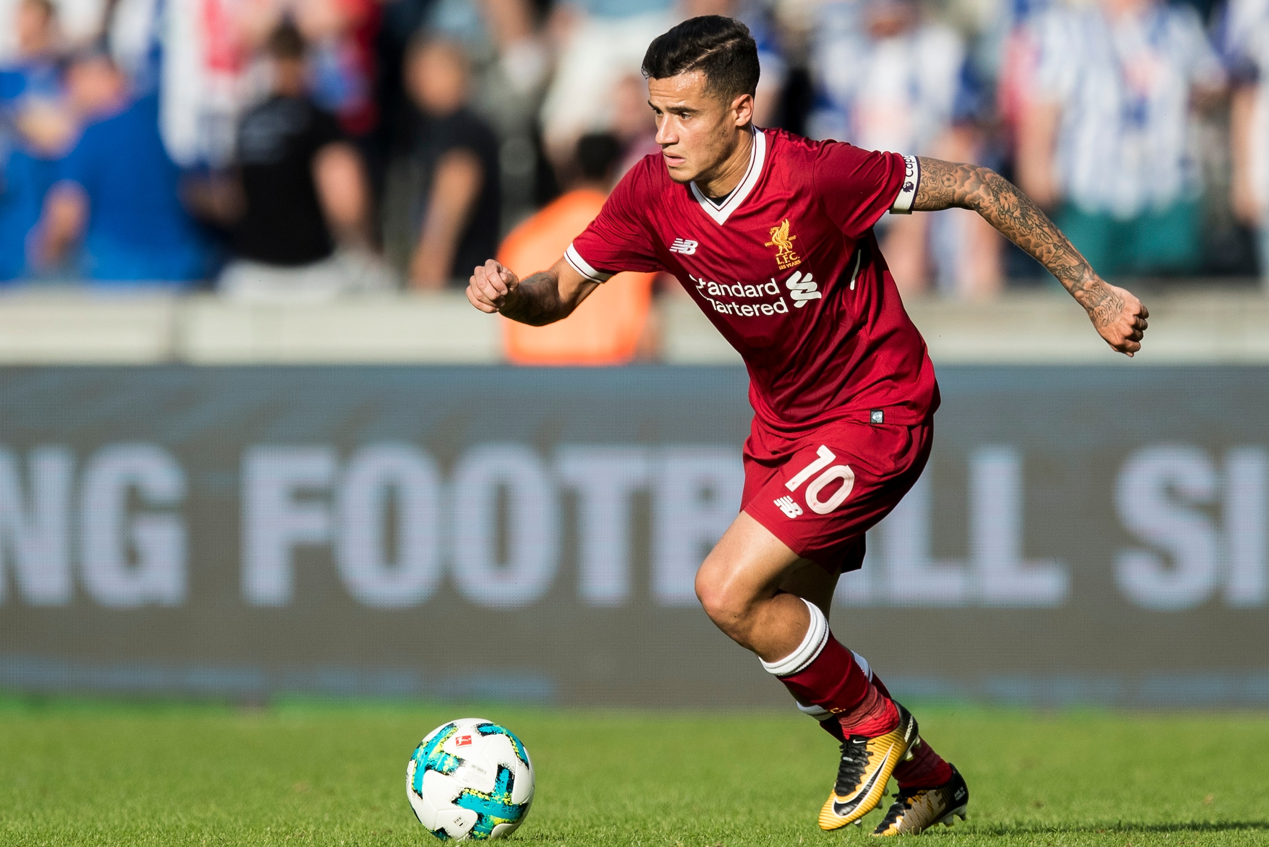 BERLIN, GERMANY - JULY 29:  Philippe Coutinho of Liverpool FC runs with the ball during the Preseason Friendly match between Hertha BSC and FC Liverpool at Olympiastadion on July 29, 2017 in Berlin, Germany.  (Photo by Boris Streubel/Getty Images)