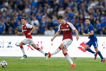 BEIJING, CHINA - JULY 22:  Granit Xhaka passes during the Pre-Season Friendly match between Arsenal FC and Chelsea FC at Birds Nest on July 22, 2017 in Beijing, China.  (Photo by Yifan Ding/Getty Images )