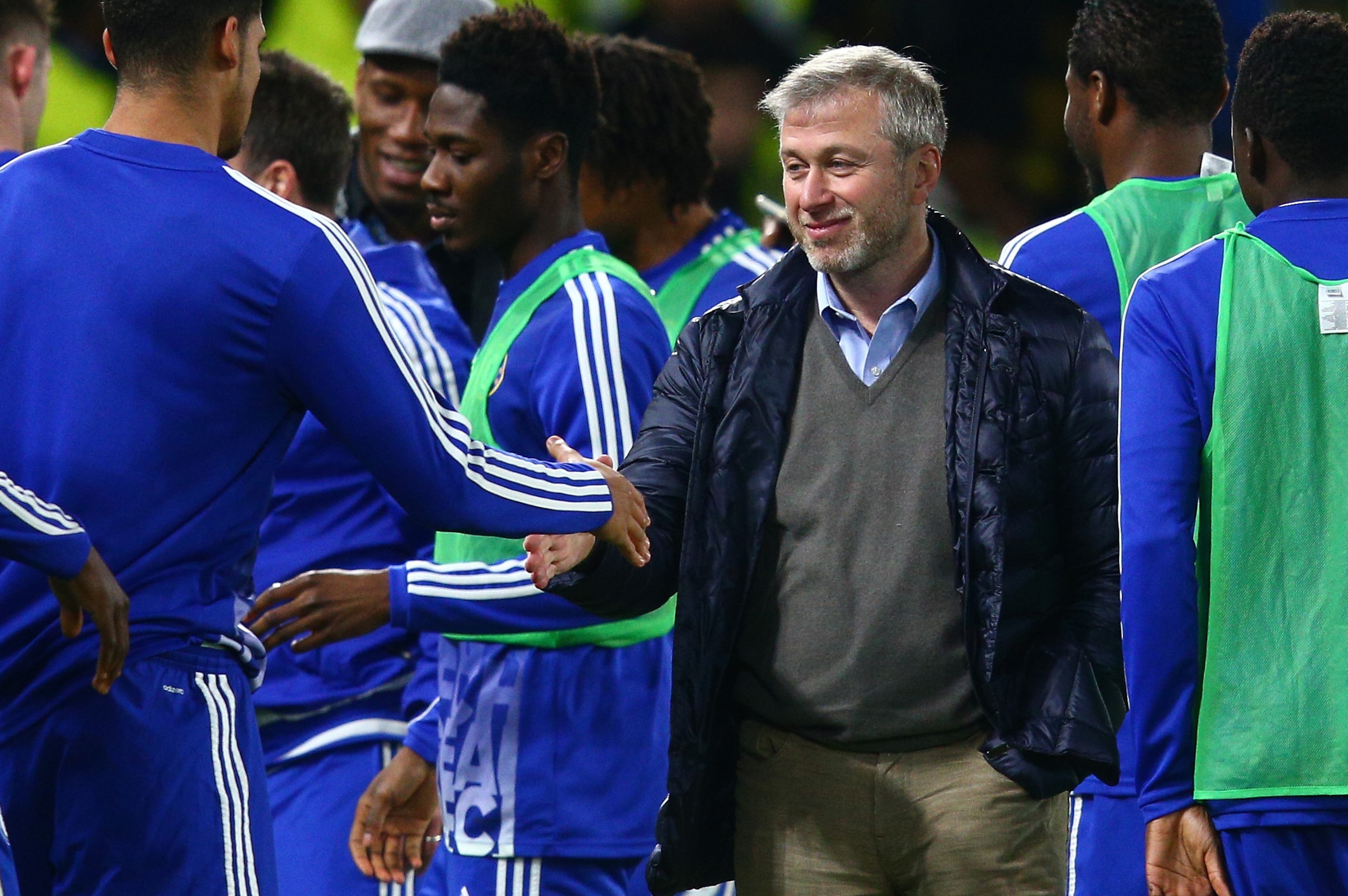 LONDON, ENGLAND - DECEMBER 19:  Chelsea owner Roman Abramovich (3rd R) congratulates players and staffs after their 3-1 win in the Barclays Premier League match between Chelsea and Sunderland at Stamford Bridge on December 19, 2015 in London, England.  (P
