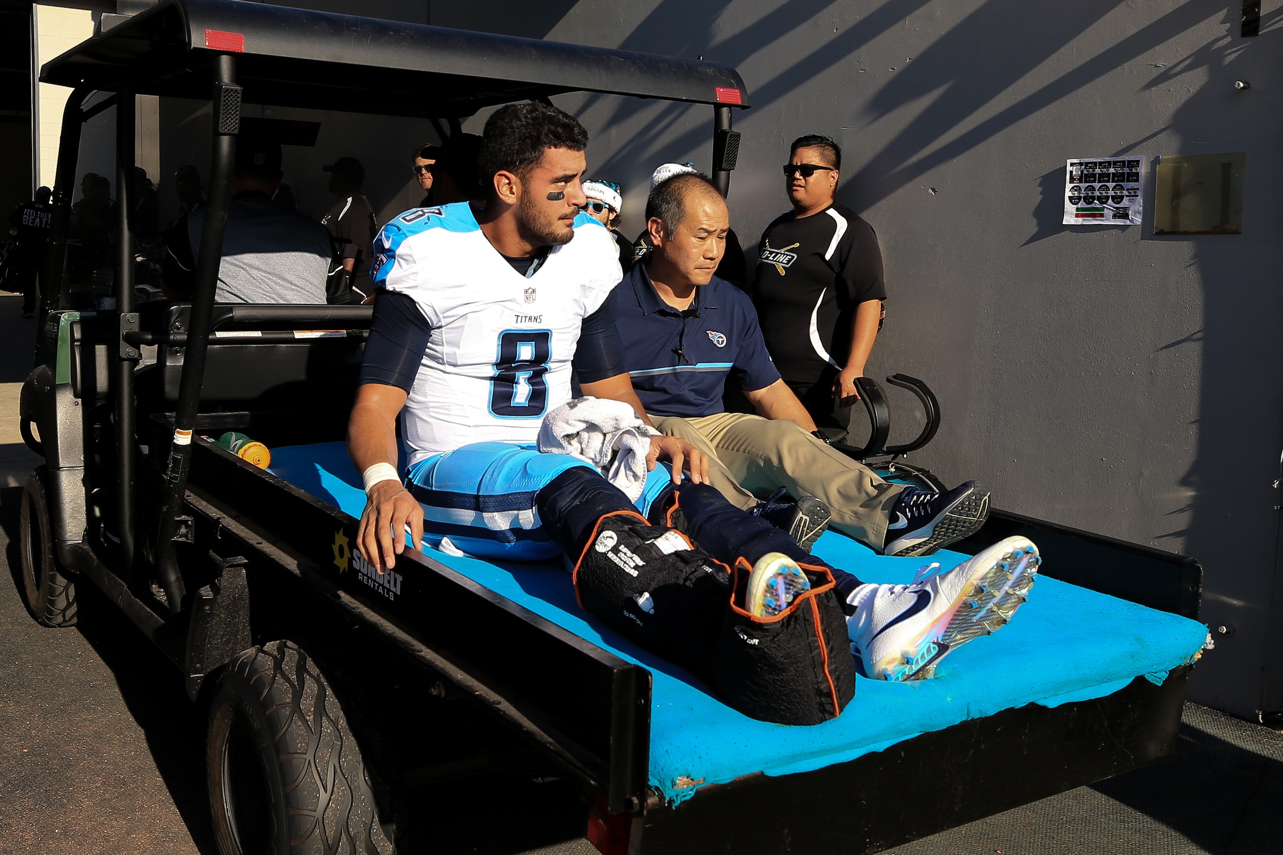 JACKSONVILLE, FL - DECEMBER 24: Marcus Mariota #8 of the Tennessee Titans is carted off the field after fracturing his fibula during the second half of the game against the Jacksonville Jaguars at EverBank Field on December 24, 2016 in Jacksonville, Flori
