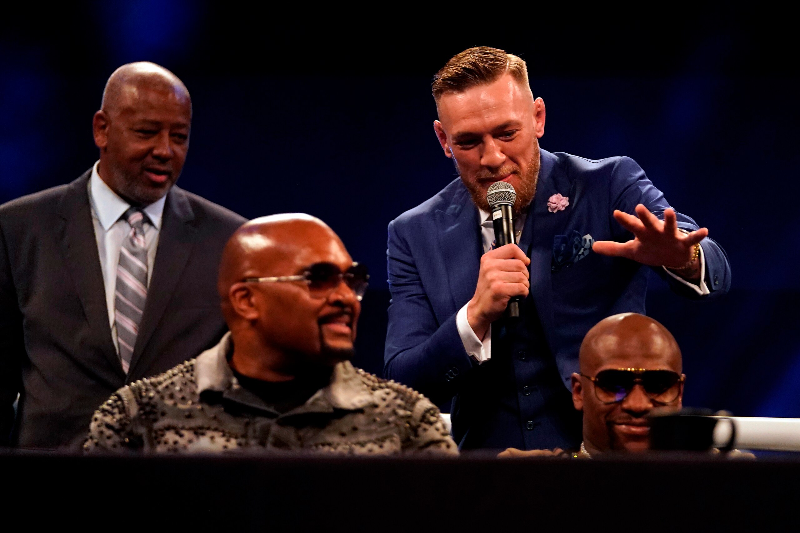 LONDON, ENGLAND - JULY 14:  Conor McGregor (R) attempts to touch the head of Floyd Mayweather Jr. during the Floyd Mayweather Jr. v Conor McGregor World Press Tour event at SSE Arena on July 14, 2017 in London, England. (Photo by Jeff Bottari/Zuffa LLC/Zu