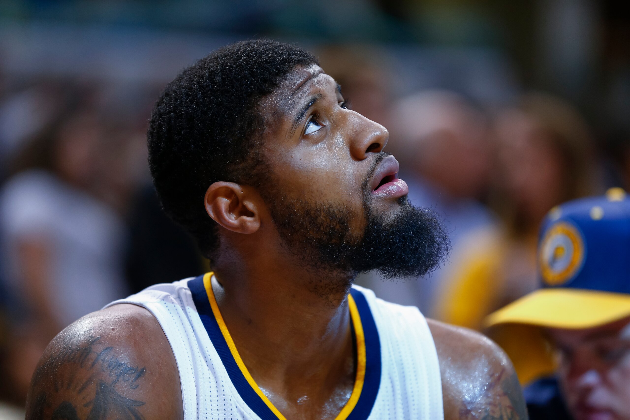 INDIANAPOLIS, IN - MARCH 08: Paul George #13 of the Indiana Pacers is seen on the bench during a timeout against the Detroit Pistons at Bankers Life Fieldhouse on March 8, 2017 in Indianapolis, Indiana. NOTE TO USER: User expressly acknowledges and agrees