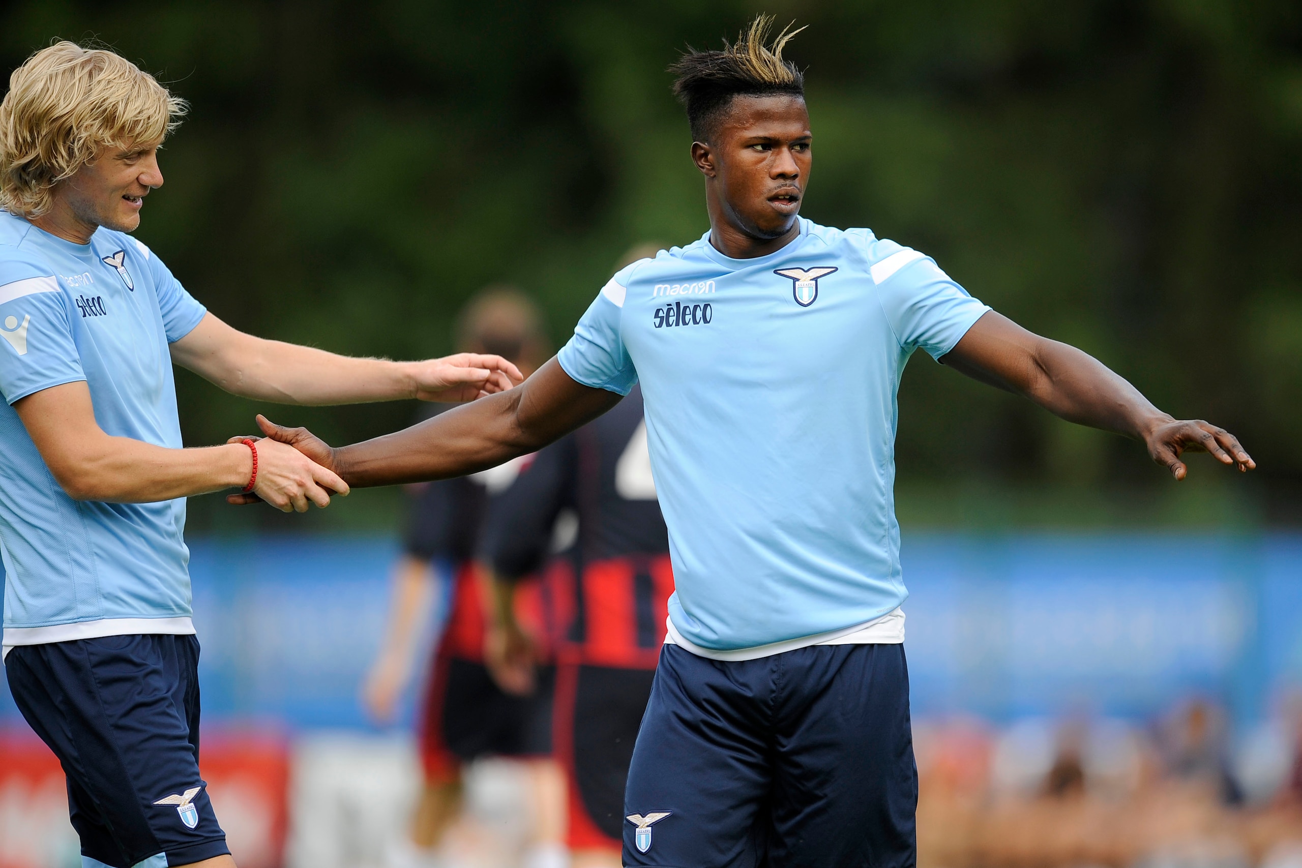 PIEVE DI CADORE, ROMA - JULY 12:  Balde Diao Keta of SS Lazio celebrates a goal with Dusan Basta of SS Lazio during the pre-season friendly match between SS Lazio and Auronzo Di Cadore on July 12, 2017 in Pieve di Cadore, Italy.  (Photo by Marco Rosi/Gett