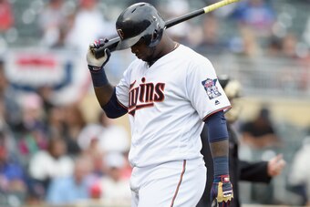 MINNEAPOLIS, MN - SEPTEMBER 25: Miguel Sano #22 of the Minnesota Twins reacts to striking out against the Seattle Mariners during the seventh inning of the game on September 25, 2016 at Target Field in Minneapolis, Minnesota. The Mariners defeated the Twi