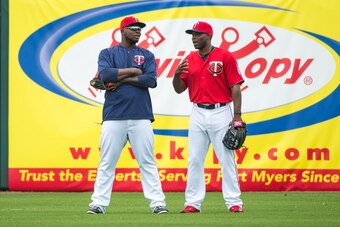 FORT MYERS, FL - MARCH 03: Miguel Sano #22 of the Minnesota Twins talks with former outfielder Torii Hunter #48 against the Boston Red Sox during a spring training game at Hammond Stadium on March 3, 2016 in Fort Myers, Florida. (Photo by Brace Hemmelgarn