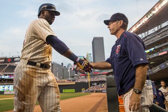 MINNEAPOLIS, MN- SEPTEMBER 07: Miguel Sano #22 of the Minnesota Twins is congratulated by Paul Molitor #4 against the Kansas City Royals on September 7, 2016 at Target Field in Minneapolis, Minnesota. The Twins defeated the Royals 6-5. (Photo by Brace Hem