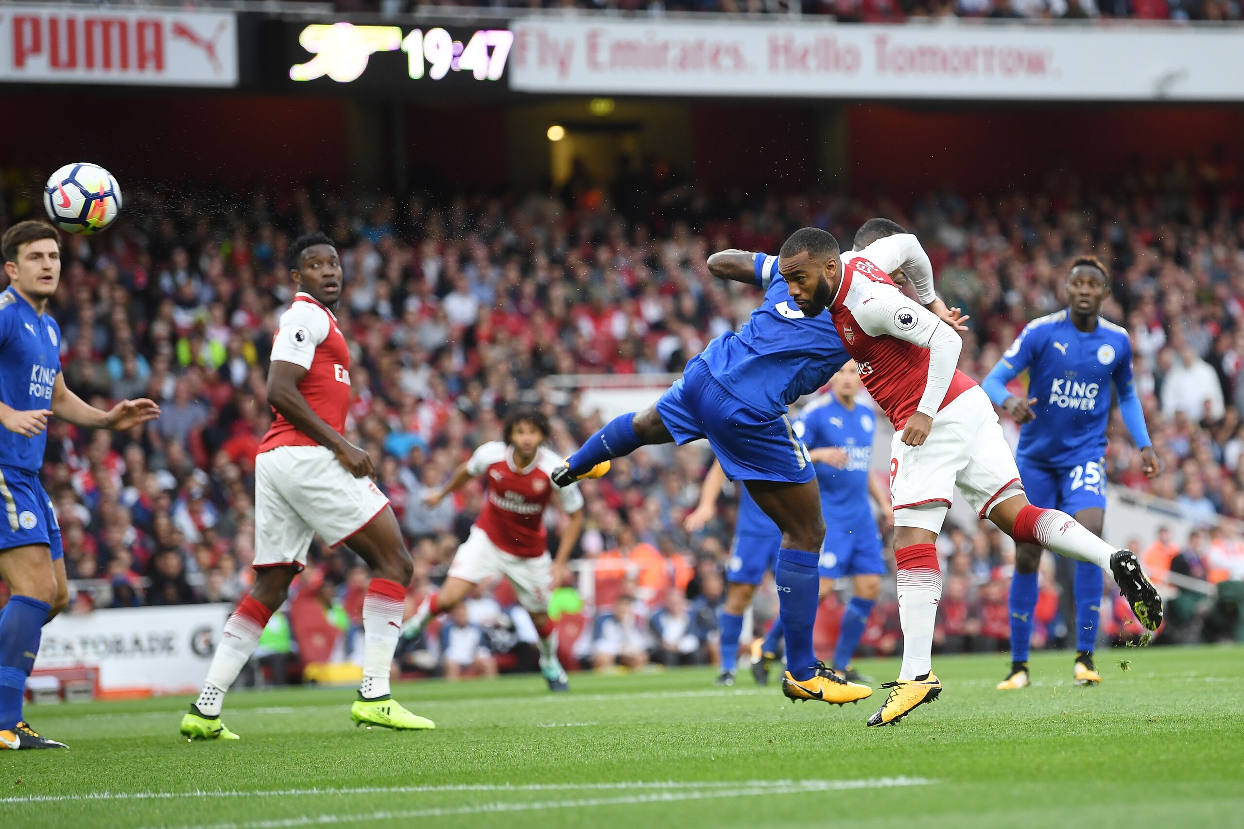 LONDON, ENGLAND - AUGUST 11:  Alexandre Lacazette of Arsenal scores the opening goal during the Premier League match between Arsenal and Leicester City at the Emirates Stadium on August 11, 2017 in London, England.  (Photo by Michael Regan/Getty Images)