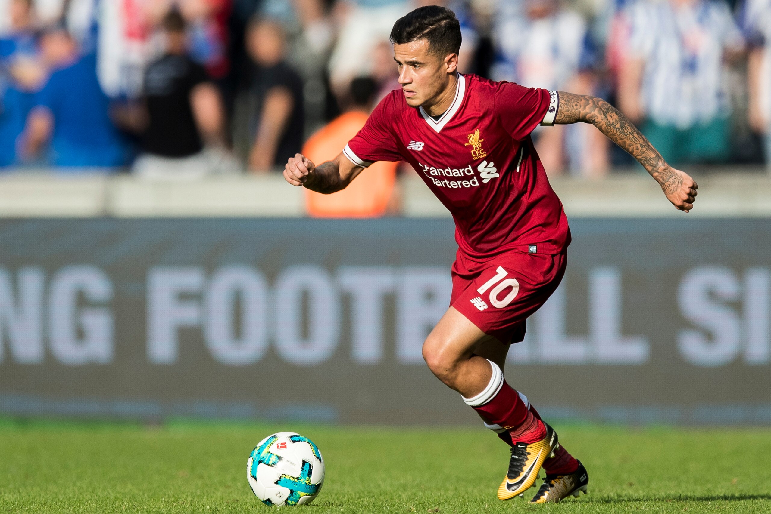 BERLIN, GERMANY - JULY 29:  Philippe Coutinho of Liverpool FC runs with the ball during the Preseason Friendly match between Hertha BSC and FC Liverpool at Olympiastadion on July 29, 2017 in Berlin, Germany.  (Photo by Boris Streubel/Getty Images)